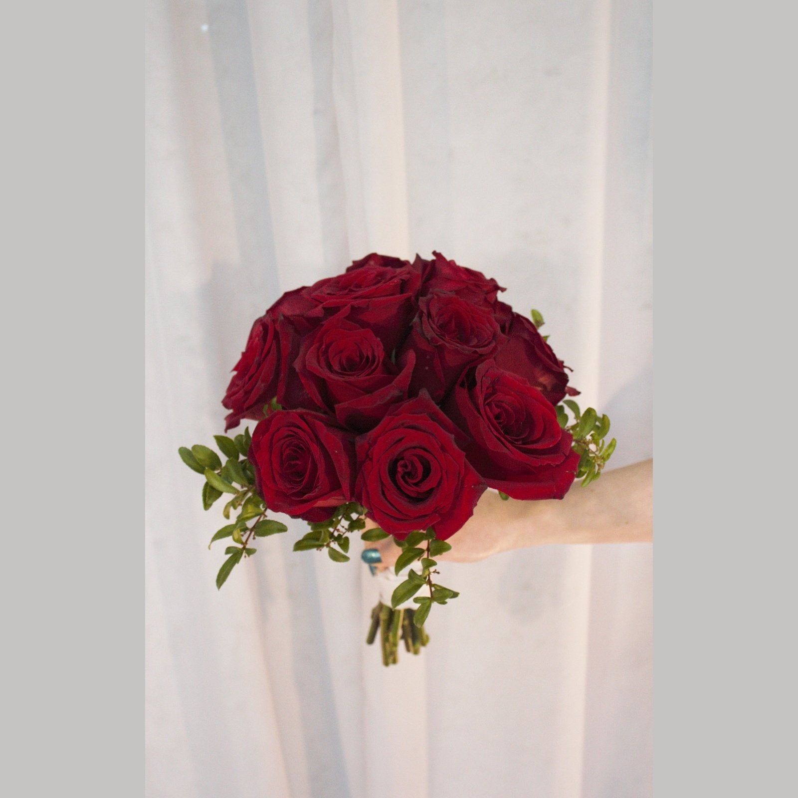 tight, classic rose bridal bouquet