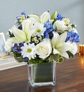 white lilies and roses in vase arrangement sympathy 